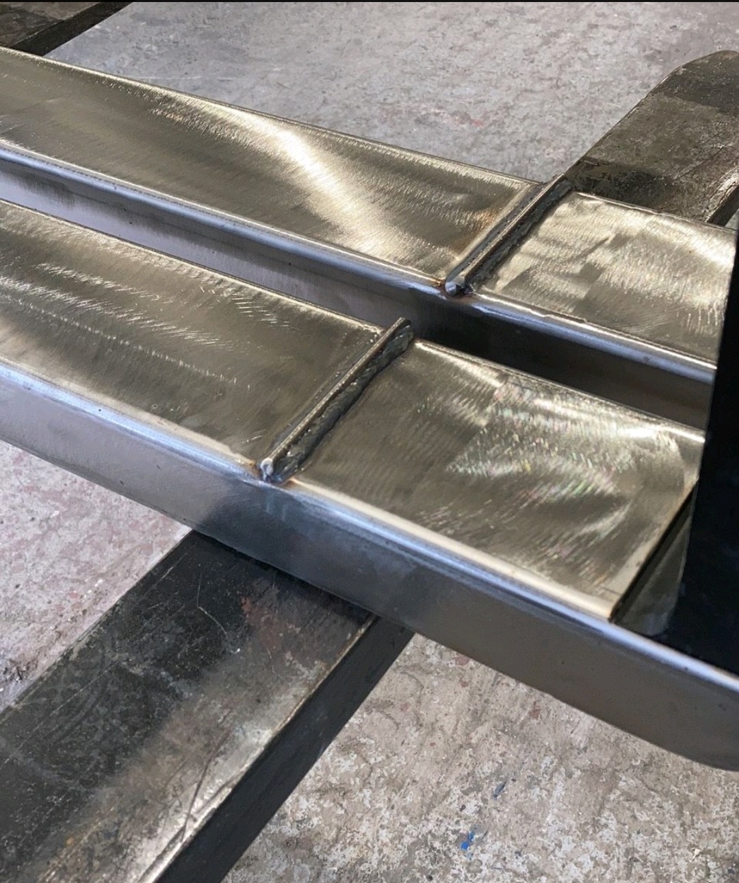 THICK TOE STAINLESS CLAD FORKS WITH PALLET STOP 1